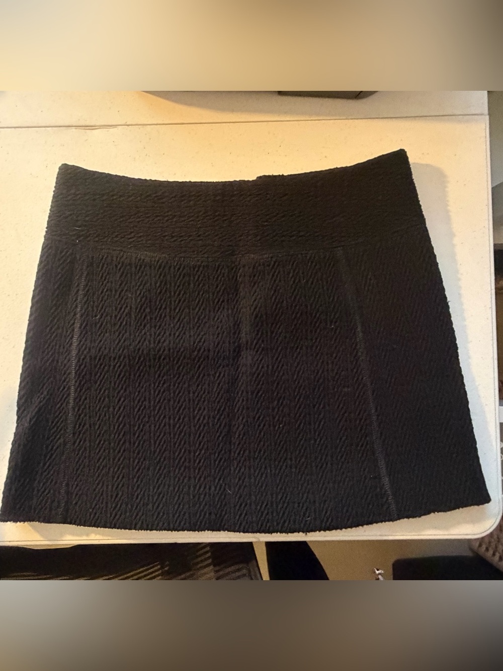 Dolce & Gabbana Black Textured mini skirt. Has been hemmed.